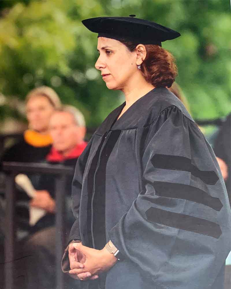 Dana being awarded a Dartmouth University PhD for her contributions to education